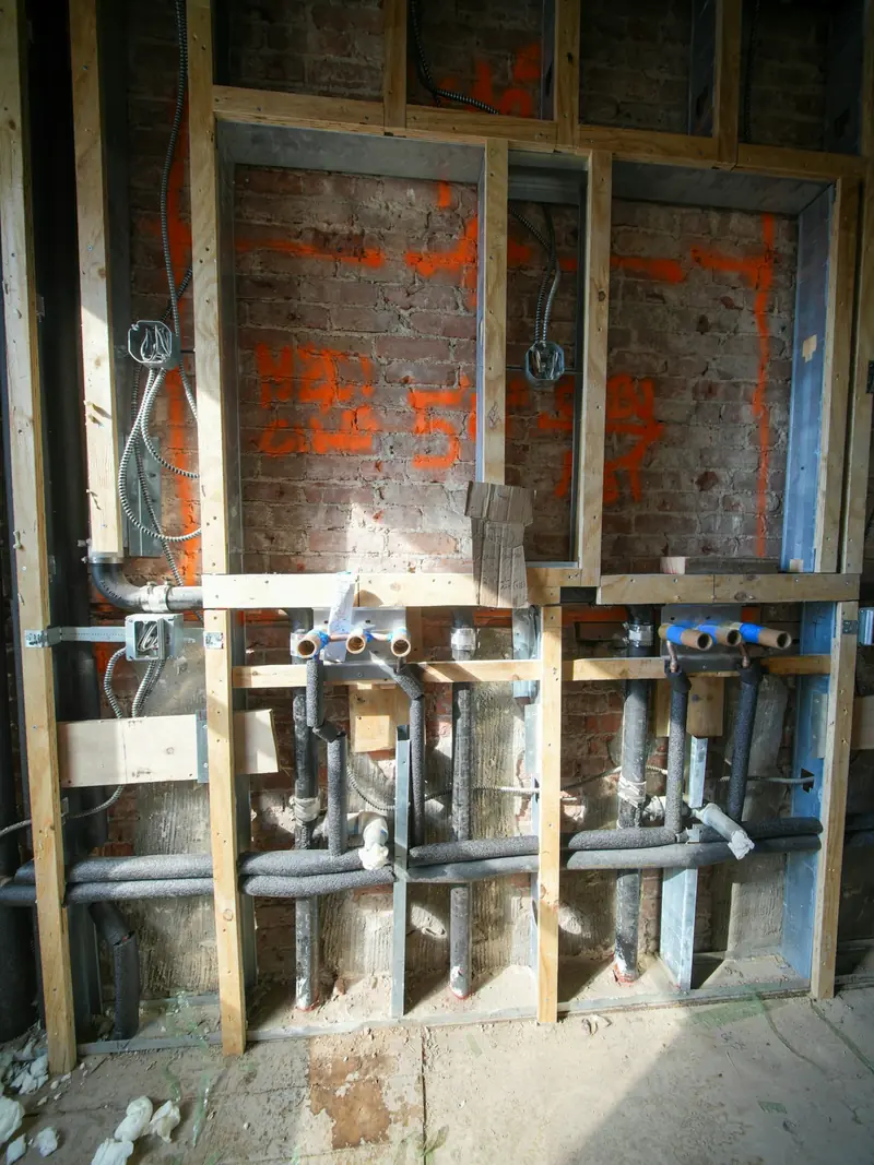 Plumbing work inside a wall